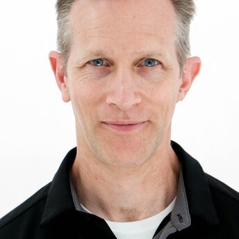 Trent Wakenight - bio photo headshot color.jpg